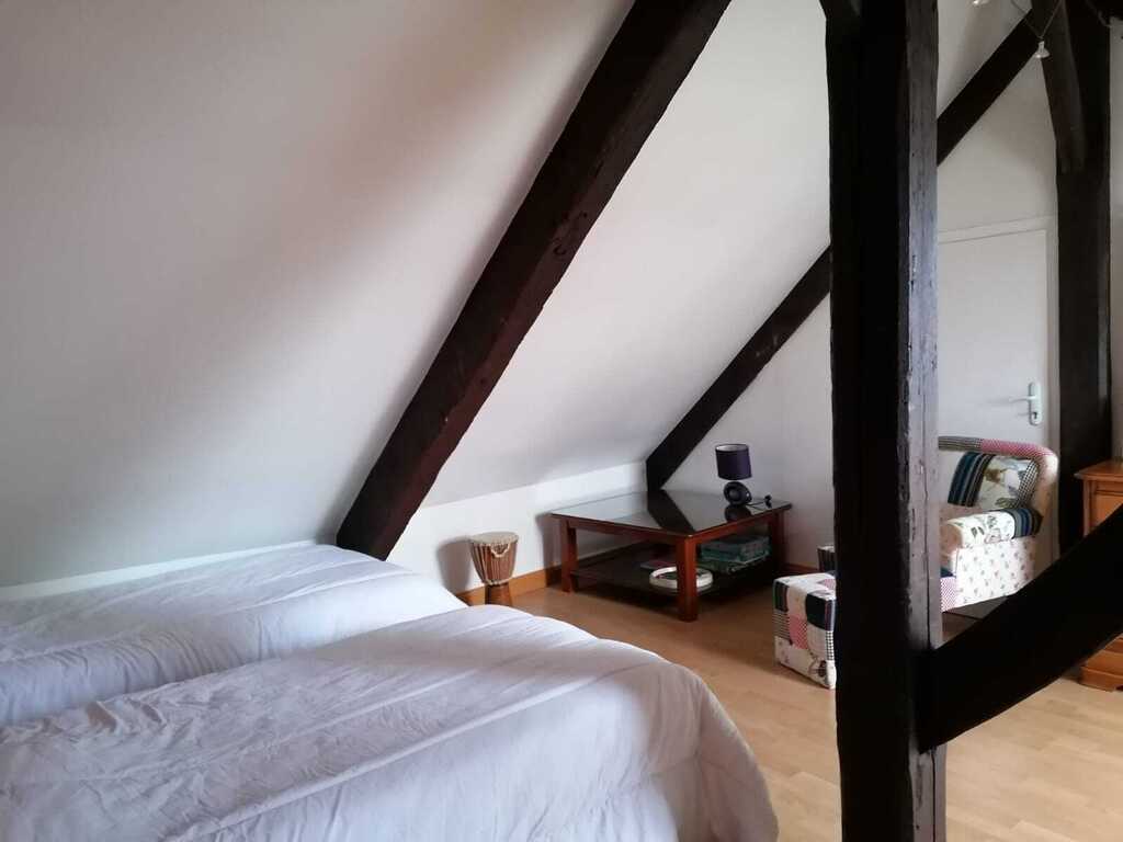 chambre à l'étage équipée de 2 lits jumeaux 90.